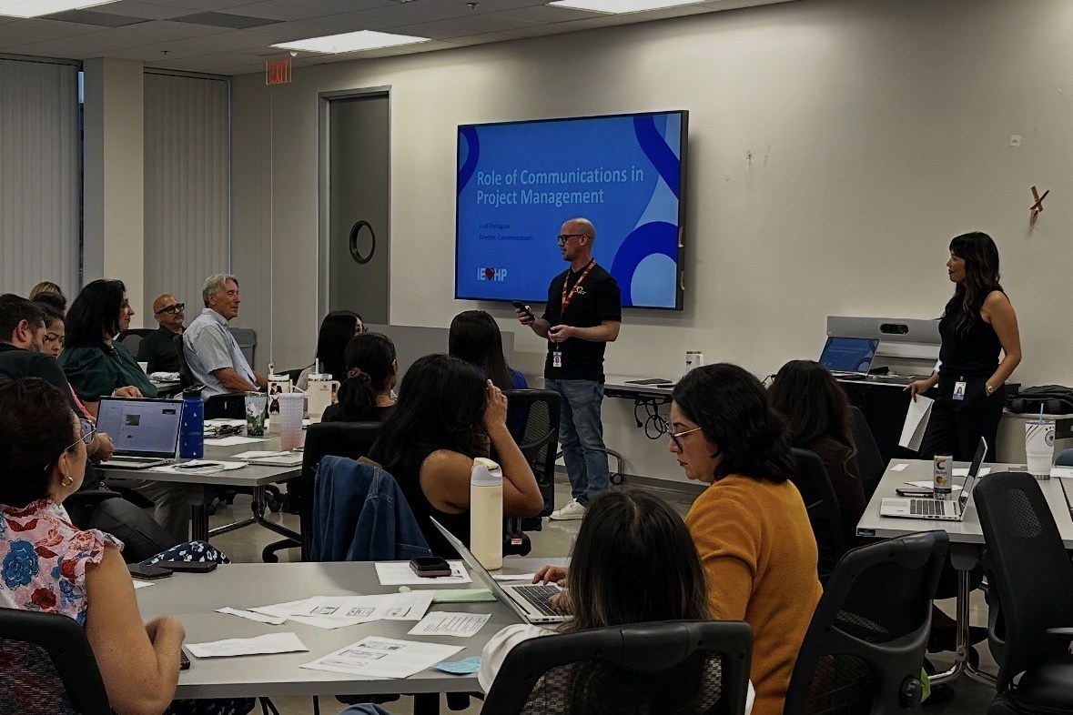 Photo of a strategy communications presentation in a conference room at IEHP